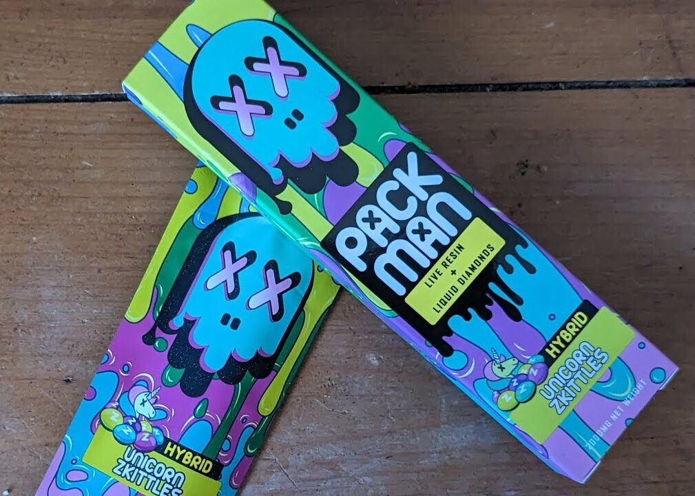 Pack Man Unicorn Zkittles Disposable Hybrid featuring sweet fruity candy flavor, premium packman disposable design, smooth airflow technology, and sleek portable vape packaging displayed in detailed product presentation.